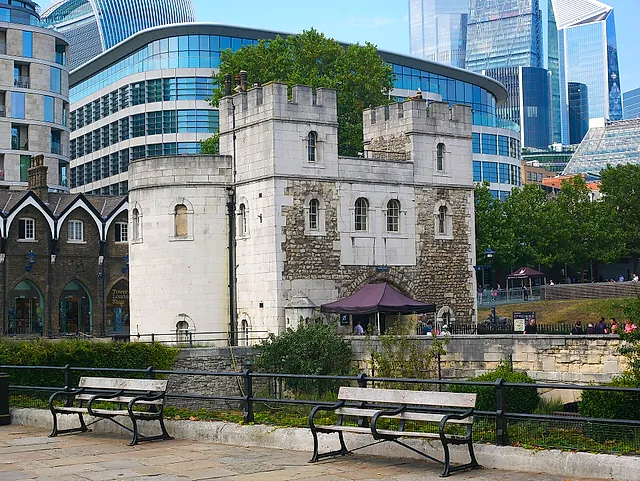 The Middle Tower, the stone gatehouse at the western entrance of the Tower of London, seen across the moat railings